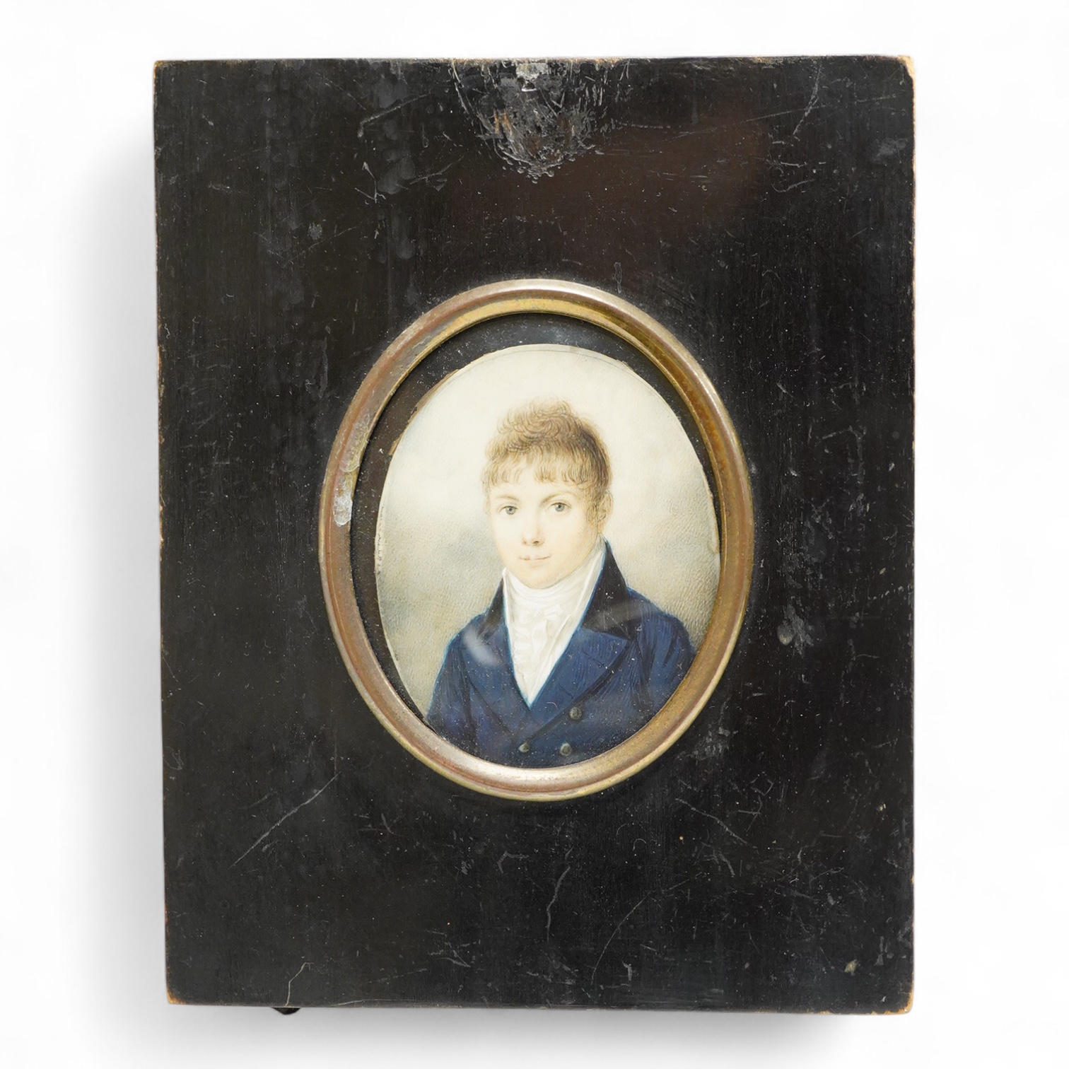 Early 19th century, English school, Portrait miniature of a gentleman, oval watercolour on ivory, housed in an ebonised frame, 7 x 5.5cm CITES Submission reference Z1N6BC77